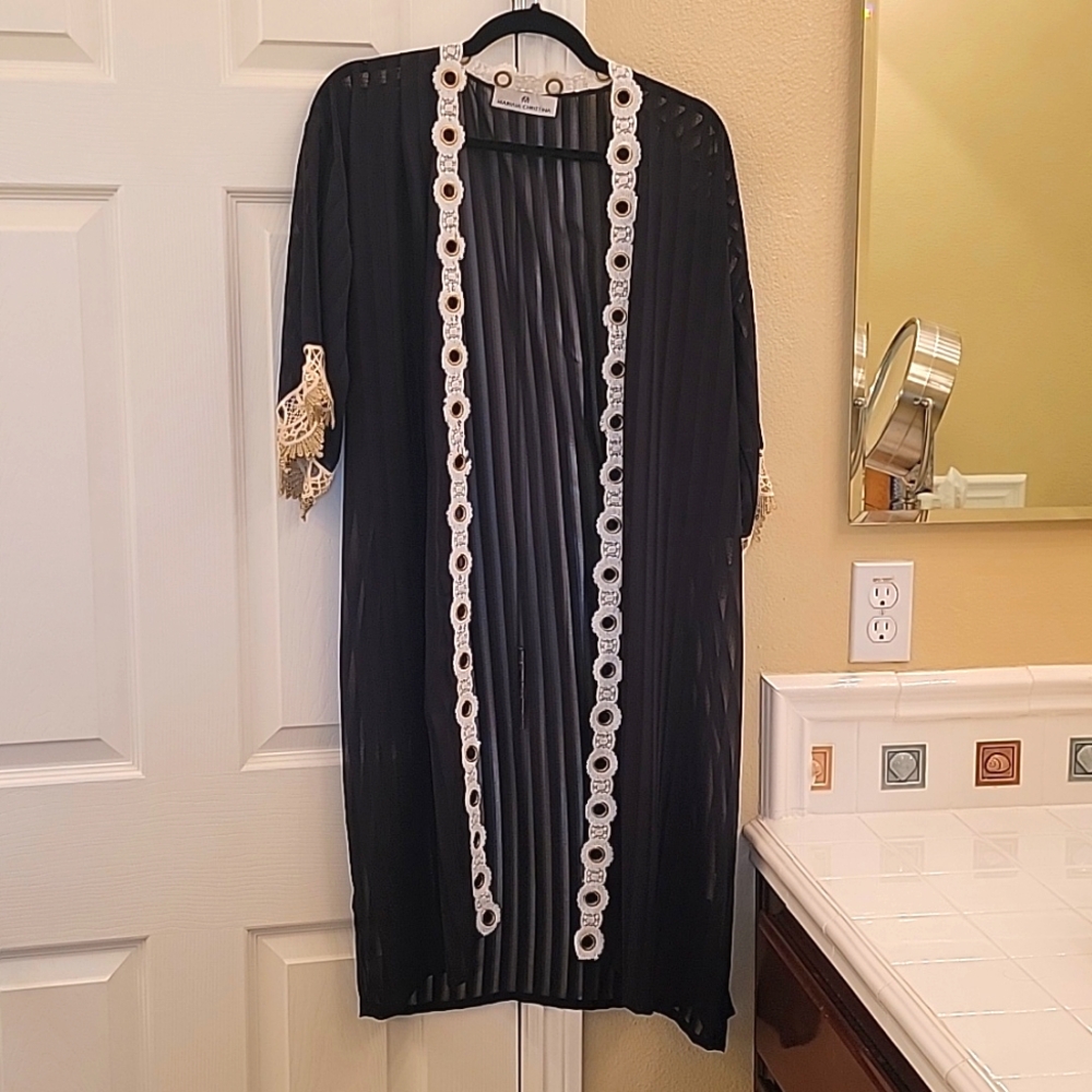 Swimsuit duster. Black sheer with subtle black vertical stripes. Cream/gold trim
